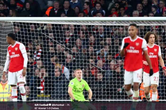 Ekspresi kekecewaan Bernd Leno usai gawangnya dibobol dua kali oleh para pemain Chelsea pada lanjutan pertandingan Liga Inggris, Minggu (29/12/2019).