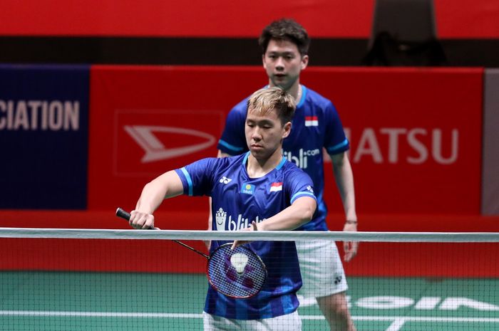 Pasangan ganda putra Indonesia, Marcus Fernaldi Gideon/Kevin Sanjaya Sukamuljo, saat menjalani laga melawan wakil Taiwan, Lin Chia Yu/Yang Ming-Tse, pada babak kesatu Malaysia Masters 2020.