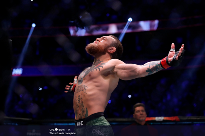 Selebrasi Conor McGregor usai menang dalam waktu 40 detik lawan Donald Cerrone pada UFC 246 di T-Mobile Arena, Las Vegas, Minggu (19/1/2020). 