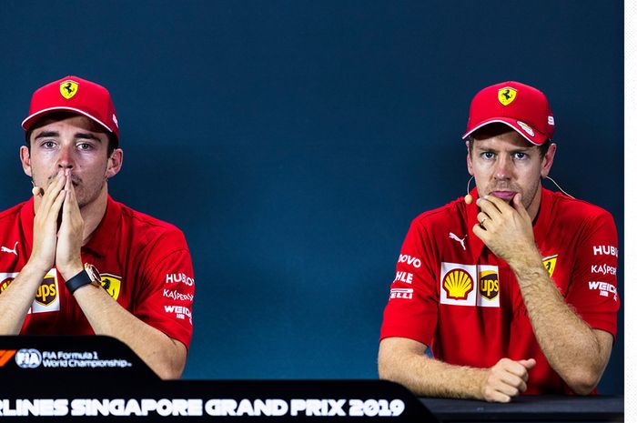 Dua pembalap Ferrari, Charles Leclerc dan Sebastian Vettel, saat konferensi pers prabalapan Formula 1 GP Singapura di Sirkuit Jalan Raya Marina Bay, 19 September 2019.