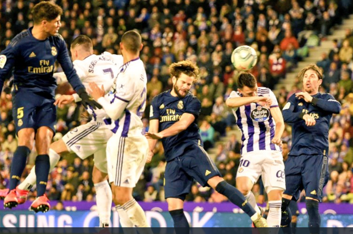 Aksi Nacho (Tengah) saat mencetak gol kemenangan Real Madrid atas Real Valladolid di pekan ke-21 Liga Spanyol, Minggu (26/1/2020) waktu setempat atau Senin dini hari WIB.