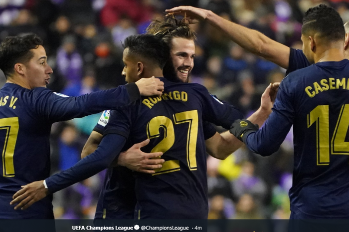 Pemain Real Madrid saat merayakan gol Nacho ke gawang Real Valladolid.