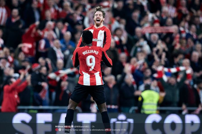 Iker Muniain merayakan golnya untuk Athletic Bilbao bersama Inaki Williams ke gawang Granada dalam partai Copa del Rey di San Mames, 12 Februari 2020.