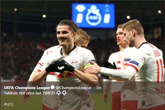 Penyerang RB Leipzig, Marcel Sabitzer, melakukan selebrasi seusai menjebol gawang Tottenham Hotspur di Red Bull Stadium, Selasa (10/3/2020).