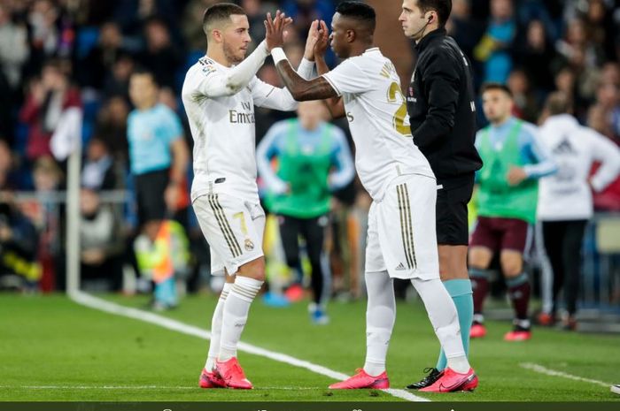 Eden Hazard (kiri) dan Vinicius Junior (kanan) sedang bersaing memperebutkan tempat di skuad utama Real Madrid.