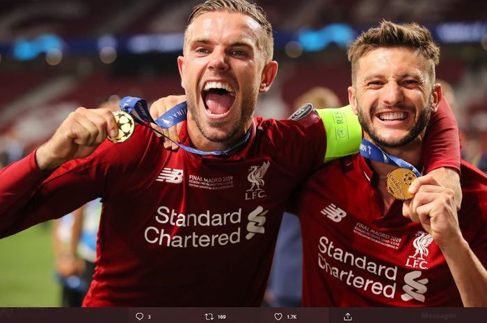 Jordan Henderson (kiri) dan Adam Lallana (kanan) saat memenangkan Liga Champions 2019.