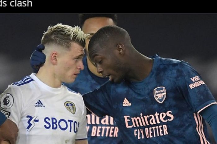 Pemain Arsenal, Nicolas Pepe, menanduk pemain Leeds United, Erzgan Elioski, dalam laga pekan ke-9, Minggu (22/11/2020) pukul 23.30 WIB. 