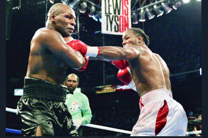 Pertarungan Mike Tyson (kiri) vs Lennox Lewis (kanan) terjadi pada 8 Juni 2002. Dalam duel itu, Lewis menjadi pemenang atas Tyson.