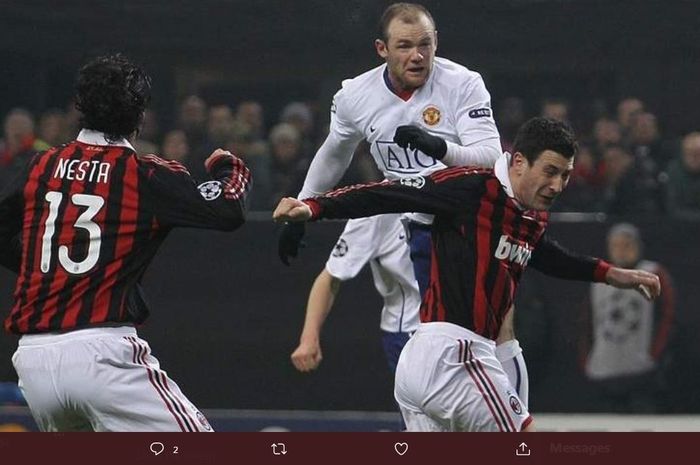 Wayne Rooney beraksi dalam partai Liga Champions antara AC Milan vs Manchester United.