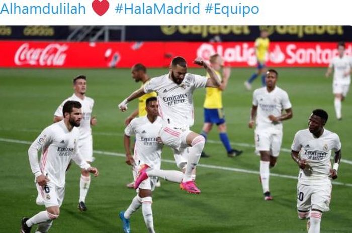 Striker Real Madrid, Karim Benzema, merayakan gol yang dicetak ke gawang Cadiz dalam laga Liga Spanyol di Stadion Ramon de Carranza, Rabu (21/4/2021).