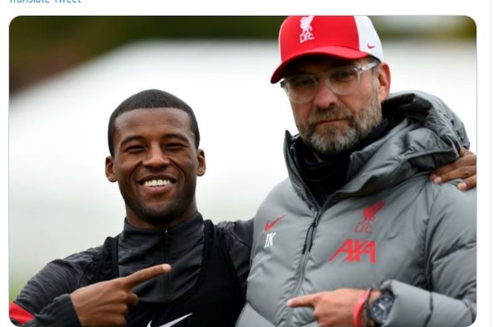 Momen kebersamaan Juergen Klopp (kanan) dengan Georginio Wijnaldum dalam sebuah sesi latihan Liverpool.