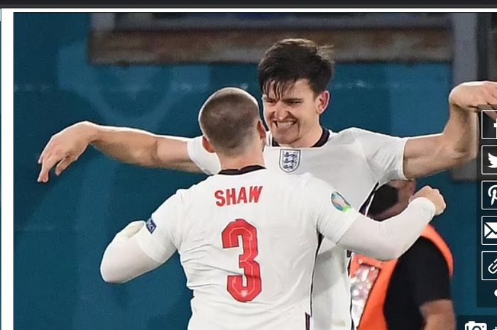 Luke Shaw ketika merayakan gol bersama Harry Maguire dalam laga Inggris vs Ukraina, Minggu (4/7/2021) dini hari WIB.