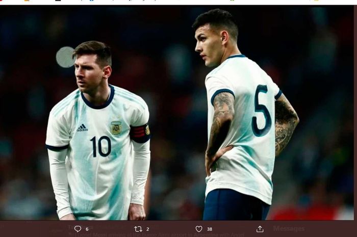 Lionel Messi dan Leandro Paredes saat mempekuat timnas Argentina.