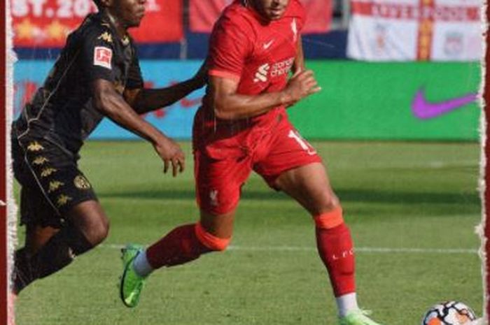 Alex Oxlade-Chamberlain saat Liverpool mengalahkan FC Mainz 05 di Salzburg, Austria pada Jumat (23/7/2021).