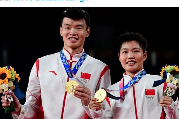 Pasangan ganda campuran China, Wang Yi Lyu/Huang Dong Ping, sukses merebut medali emas Olimpiade Tokyo 2020 usai mengalahkan Zheng Si Wei/Huang Ya Qiong di Musashino Forest Plaza, Tokyo, Jumat (30/7/2021).