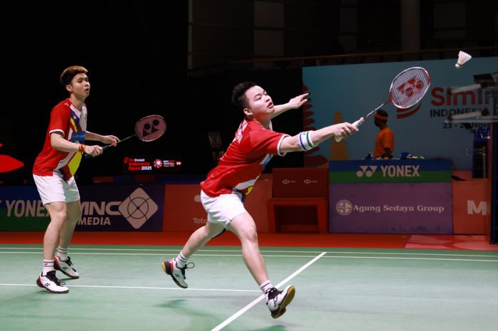 Pasangan ganda putra Malaysia, Aaron Chia/Soh Wooi Yik, pada Indonesia Open 2021 di Bali International Convention Centre, Nusa Dua, Selasa (23/11/2021).