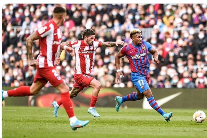 Aksi Adama Traore bersama Barcelona dalam laga kontra Atletico Madrid.