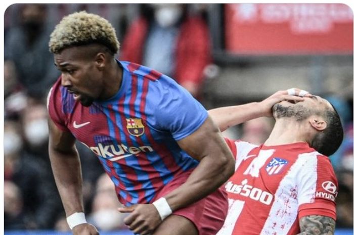 Bek Atletico Madrid, Hermoso, kesakitan saat menjaga winger Barcelona, Adama Traore.