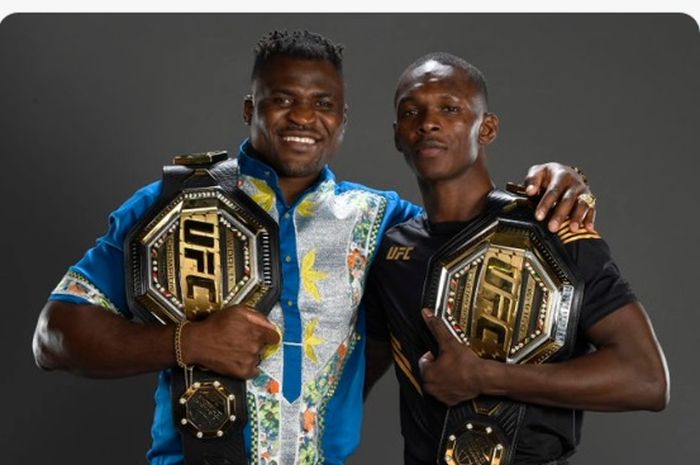 Eks juara kelas berat, Francis Ngannou (kiri), petarung UFC, Israel Adesanya (kanan).