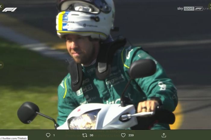 Pembalap Aston Martin, Sebatian Vettel, dihukum gegara mengendarai motor di lintasan setelah sesi latihan bebas pertama Formula 1 GP Australia di Sirkuit Melbourne, Australia, 8 April 2022.