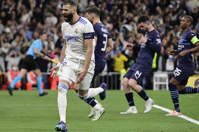 Striker Real Madrid, Karim Benzema, merayakan gol ke gawang Manchester City dalam laga leg kedua semifinal Liga Champions di Stadion Santiago Bernabeu, Rabu (4/5/2022).