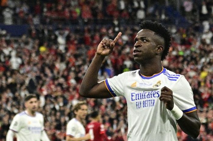 Striker Real Madrid, Vinicius Junior, merayakan gol ke gawang Liverpool dalam laga final Liga Champions di Stadion Stade de France, 28 Mei 2022.