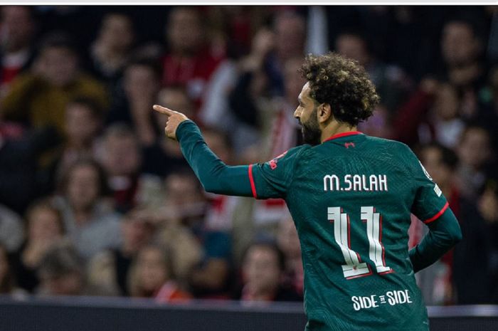 Selebrasi winger Liverpool, Mohamed Salah, usai mencetak gol ke gawang Ajax Amsterdam dalam matchday 5 Grup A Liga Champions 2022-2023, Rabu (26/10/2022) waktu setempat atau Kamis dini hari WIB.