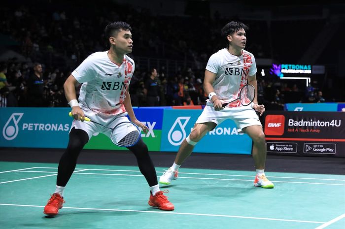 Pasangan ganda putra Indonesia, Leo Rolly Carnando/Daniel Marthin, pada babak pertama Malaysia Open 2023 di Axiata Arena, Kuala Lumpur, Rabu (11/1/2023).