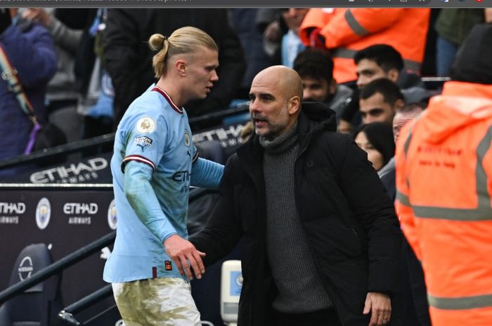 Erling Haaland (kiri) dan Pep Guardiola (kanan) dalam sebuah pertandingan untuk Manchester City.