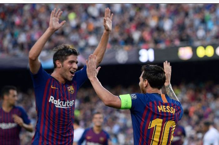 Momen Sergi Roberto dengan Lionel Messi saat di Barcelona.