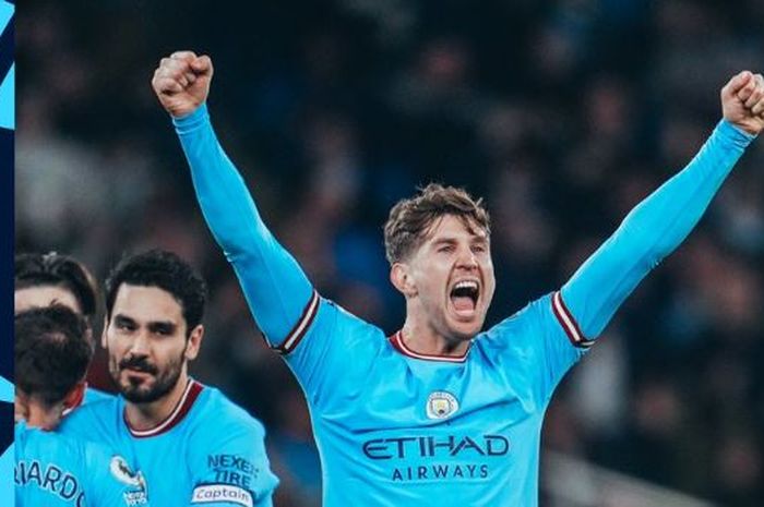 Bek Manchester City, John Stones, merayakan gol ke gawang Arsenal dalam laga Liga Inggris di Stadion Etihad, Rabu (26/4/2023).