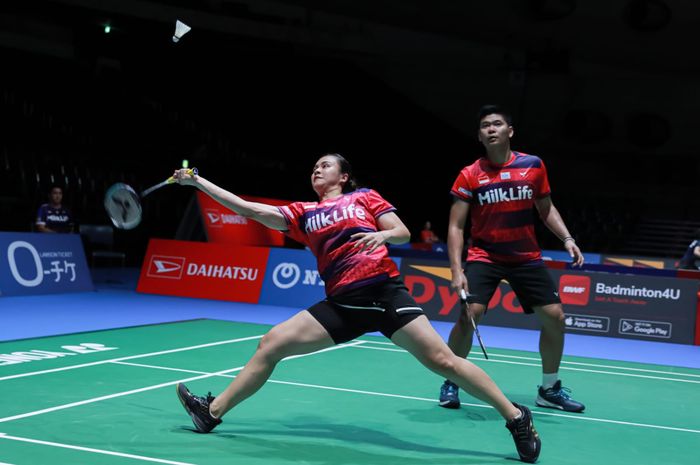 Aksi ganda campuran Indonesia, Praveen Jordan/Melati Daeva Oktavianti, saat babak pertama Japan Open 2023 di Yoyogi Gymnasium Tokyo, Jepang, 25 Juli 2023.