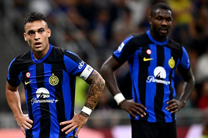 Lautaro Martinez (kiri) gagal mencetak gol walau melepaskan 10 tembakan dalam duel Inter Milan vs Benfica di Liga Champions (3/10/2023), di mana Marcus Thuram jadi sosok penentu kemenangan Nerazzurri.