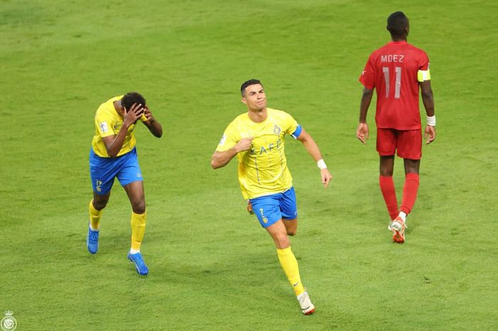 Cristiano Ronaldo merayakan gol untuk Al Nassr ke gawang Al Duhail pada matchday 3 Liga Champions Asia 2023-2024 di Stadion Al Awwal Park, Selasa (24/10/2023).