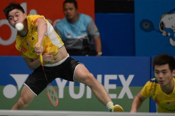 Mantan ganda putra Malaysia,Tan Boon Heong berpasangan dengan Tan Wee Kiong  pada Indonesia Open 2014, 20 Juni 2014.