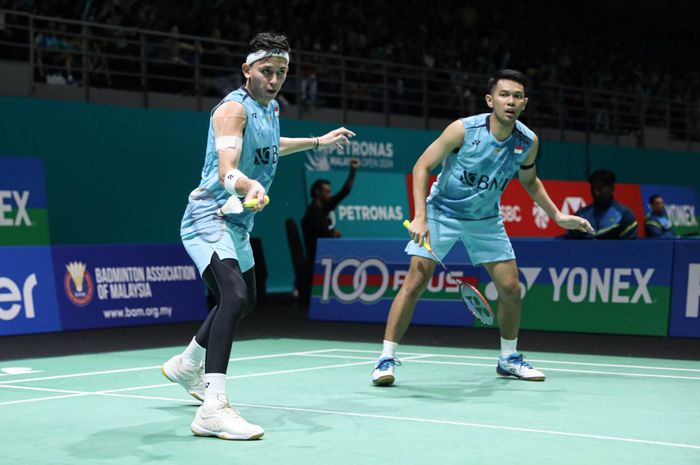 Pasangan ganda putra Indonesia, Fajar Alfian/Muhammad Rian Ardianto, pada babak pertama Malaysia Open 2024 di Axiata Arena, Bukit Jalil, Kuala Lumpur,  Selasa (9/1/2024).