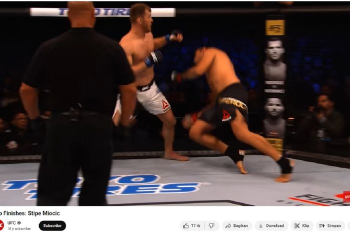 Stipe Miocic menang KO atas Fabricio Werdum untuk menjadi juara kelas berat UFC, 14 Mei 2016 di Curitiba, Brasil.
