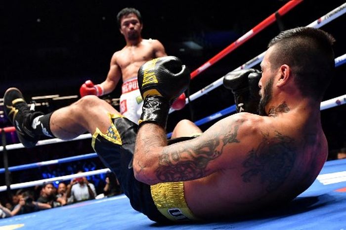 Setelah tidak pernah menang KO selama 8 tahun, Manny Pacquiao 3 kali merobohkan Lucas Matthysse dalam laga perebutan sabuk juara dunia tinju kelas welter WBA di Axiata Arena, Kuala Lumpur, 15 Juli 2018.