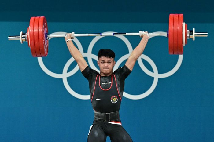 Lifter Indonesia, Rizki Juniansyah mempersembahkan medali emas kedua Olimpiade Paris 2024, Jumat (9/8/2024)