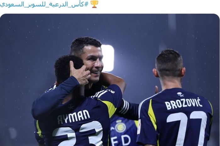 Cristiano Ronaldo merayakan kemenangan Al Nassr atas Al Taawoun pada semifinal Piala Super Arab Saudi 2024.