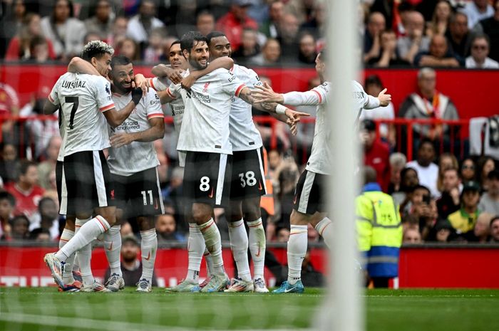 Mohamed Salah merayakan golnya untuk Liverpool ke gawang Manchester United pada matchweek 3 Liga Inggris 2024-2025 di Stadion Old Trafford, Minggu (1/9/2024).