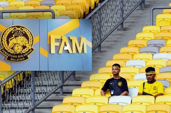 Tribun yang hampir kosong di Stadion Nasional Bukit Jalil hanya memperlihatkan dua penggemar Harimau Malaya yang menunggu pertandingan melawan Filipina di Piala Merdeka 2024.