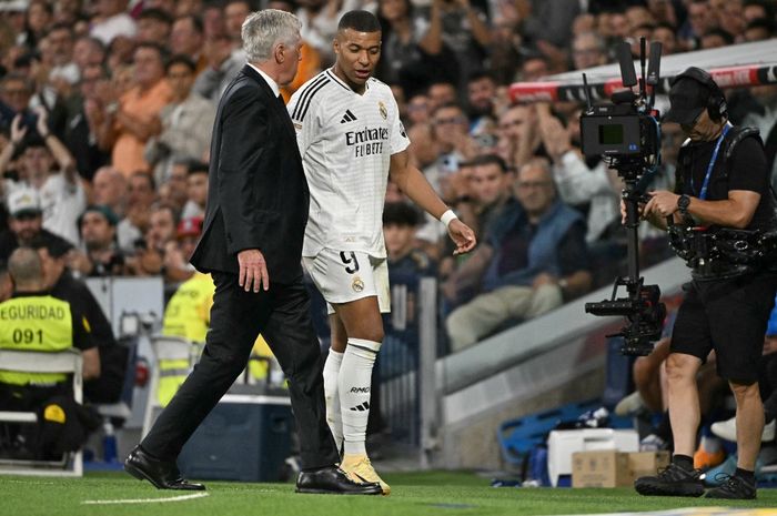 Dengan Real Madrid malah kelihatan rusak setelah kedatangan Kylian Mbappe, pelatih Carlo Ancelotti kini disebut-sebut berada dalam posisi terancam dipecat.