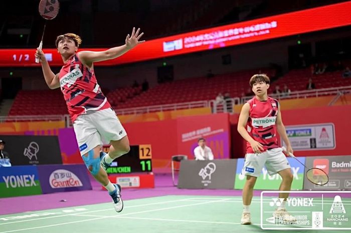 Pasangan ganda putra Malaysia, Kang Khai Xing dan Aaron Tai, keluar sebagai Juara Dunia Junior 2024 pada laga final di Nanchang International Sports Center, China, Minggu (13/10/2024).