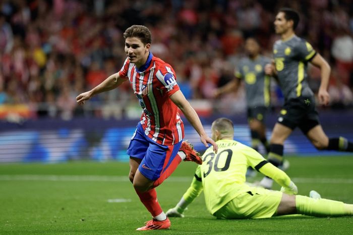 Julian Alvarez saat merayakan gol untuk Atletico Madrid ke gawang Lille dalam partai Liga Champions di Stadion Metropolitano (23/10/2024).