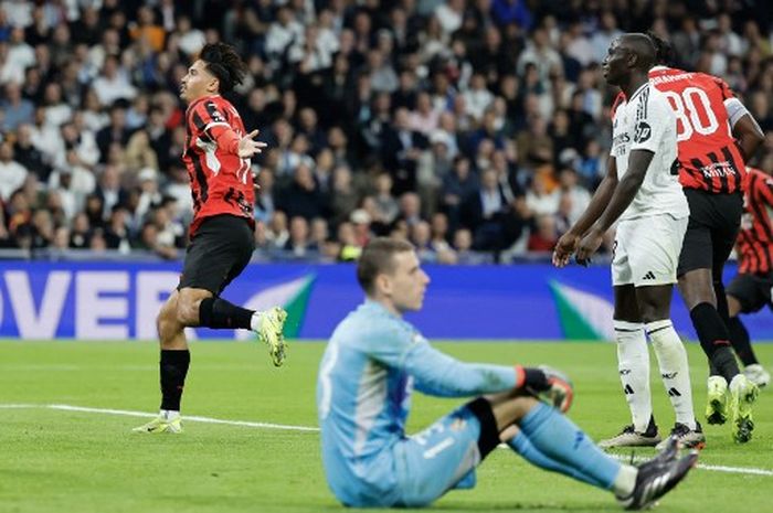 Tijjani Reijnders merayakan gol yang dicetaknya dalam laga AC Milan menghadapi Real Madrid di Liga Champions, Selasa (5/11/2024) di Santiago Bernabeu.