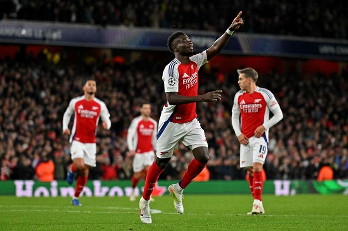 Winger Arsenal, Bukayo Saka, merayakan gol ke gawang AS Monaco pada laga Liga Champions di Stadion Emirates, Rabu (11/12/2024).
