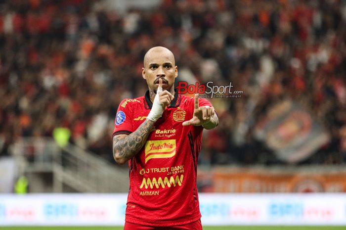 Gustavo Almeida sedang melakukan selebrasi seusai mencetak gol dalam laga pekan ke-16 Liga 1 2024 antara Persija Jakarta versus PSS Sleman di Jakarta International Stadium (JIS), Jakarta Utara, Sabtu (21/12/2024).