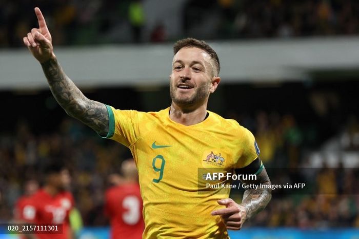 Adam Taggart dari Australia merayakan gol dalam pertandingan Kualifikasi Piala Dunia 2026 melawan Palestina.