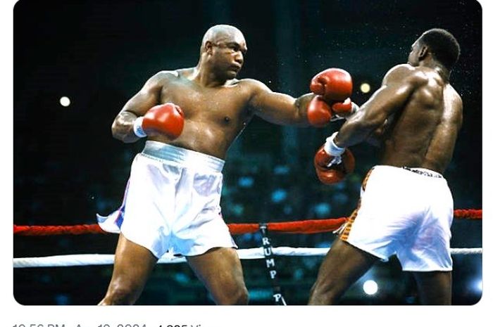 George Foreman menyulitkan Evander Holyfield yang 14 tahun lebih muda dari dirinya saat mereka bertarung pada 19 April 1991. 